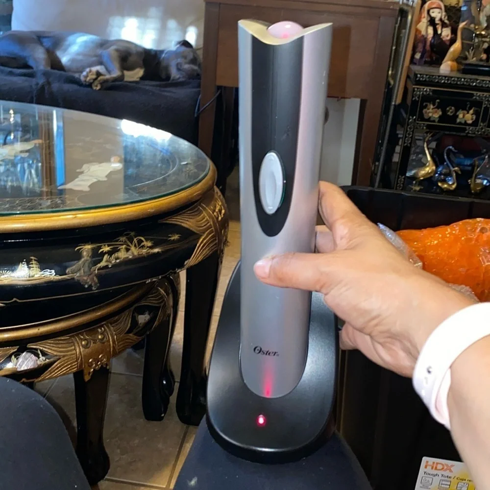 Bx47 Oster electric wine opener works fine